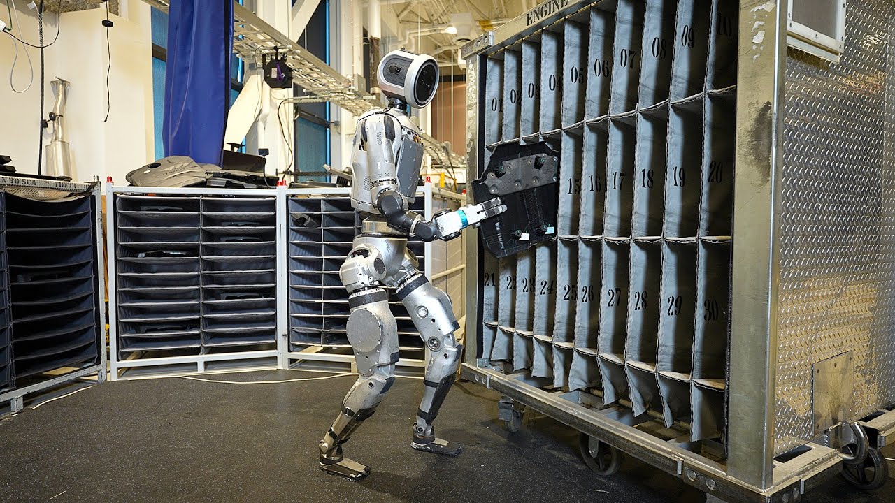 Atlas handling automotive parts in the official Boston Dynamics video
